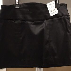 Bebe black satin mini skirt